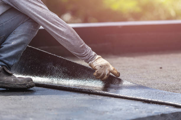 Professional Basement Waterproofing technician working in Adamsville, OH